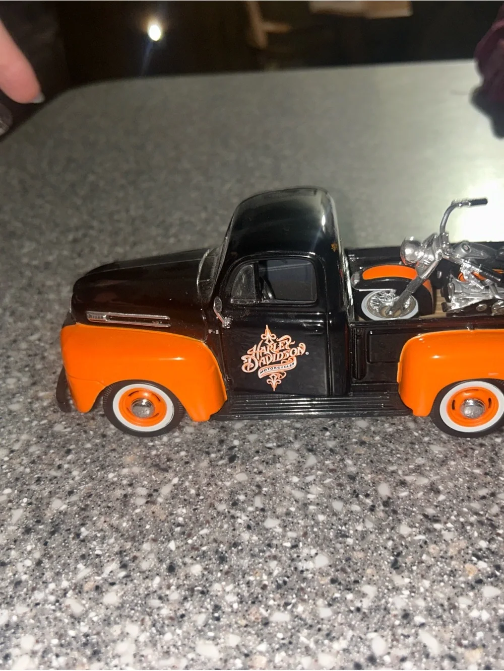 Harley-Davidson Black and Orange Truck with Motorcycle